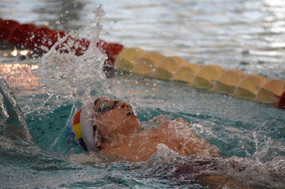 Young athletes training together in a vibrant sports environment